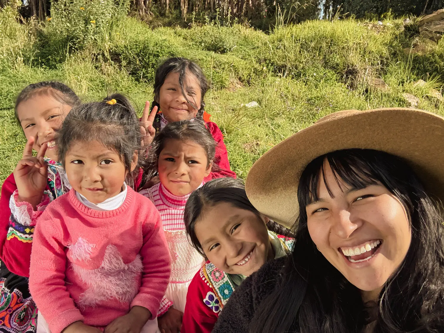 From left to right: presenters Camila, Lucero, Keyla, and Urpi, alongside Sapiens co-founder Alessandra Yupanqui, during filming in Cusco, Peru. Photo: Sapiens