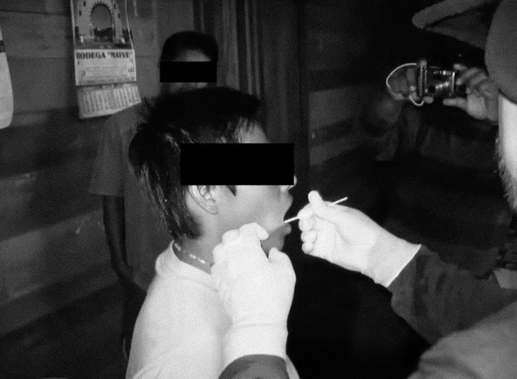 Sample collection (cheek swab). Credit: Pierina Danos / USMP