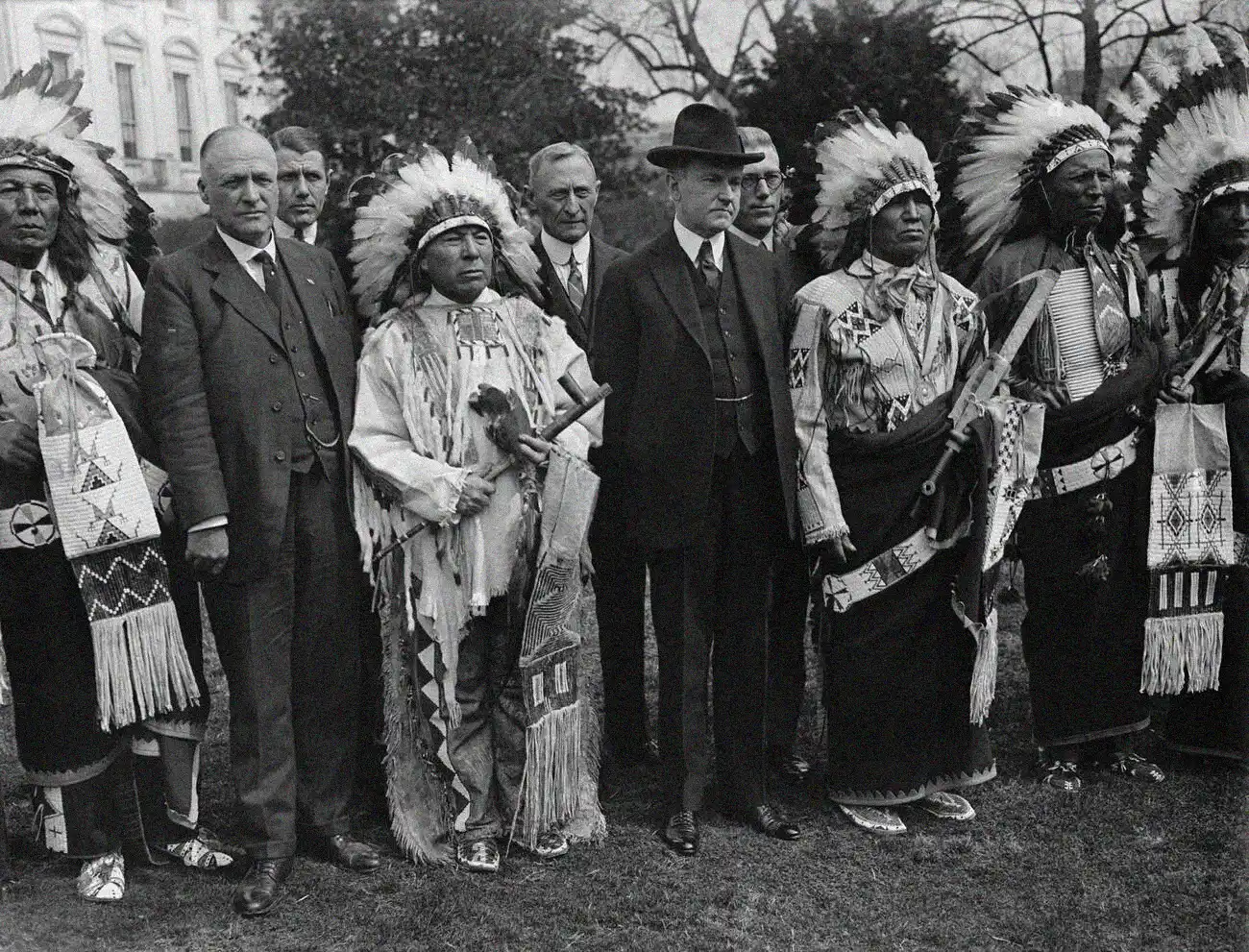 President Calvin Coolidge with Native American leaders at the White House. On June 2, 1924, Coolidge signed the Indian Citizenship Act, legally recognizing all Native Americans in the United States as citizens. Source: Library of Congress
