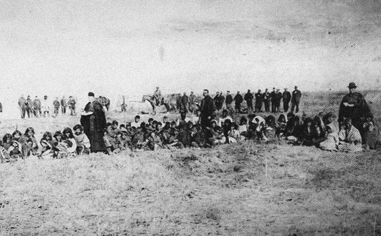 Concentration camp where priests evangelize indigenous captives during the Conquest of the Desert, combining military violence and religious imposition to strip them of their identity and territory. Photo: Antonio Pozzo, 1879.