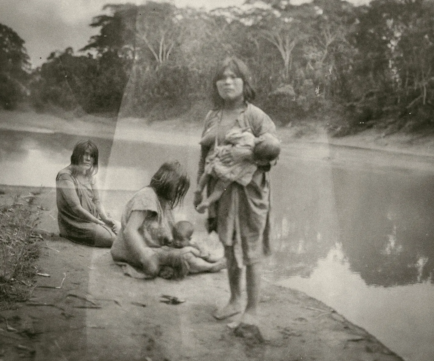 Women of the Ese Eja people on the banks of a river, Madre de Dios.
